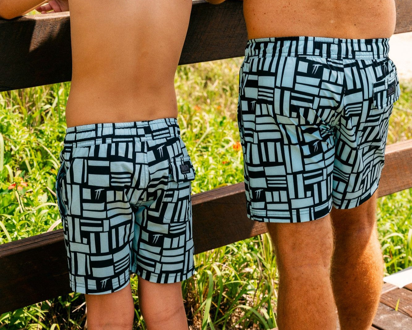 Matching boys Mint Geo hybrid lined anti-chafe boardshorts with quick dry 4-way stretch fabric