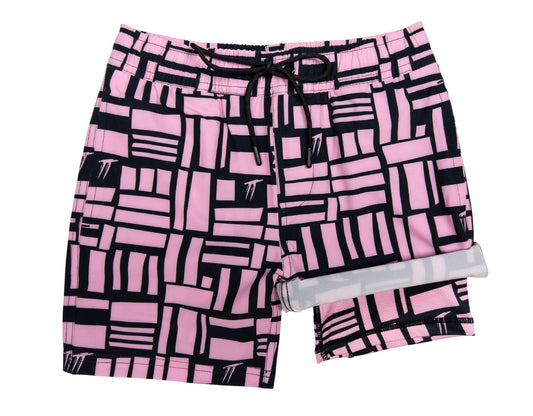 Boys' Pink Geo hybrid anti-chafe boardshorts, pink and black geometric print, front with built-in liner - Thirsty Threads 1920